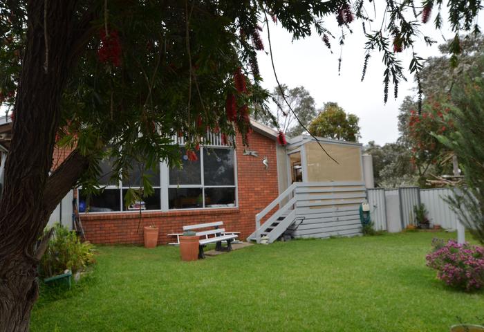 BRICK HOME NESTLED BETWEEN LAKE VICTORIA AND THE 90 MILE BEACH 