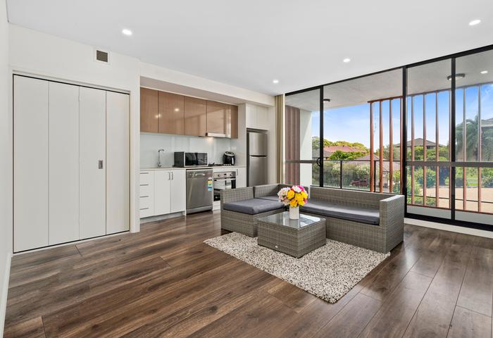 Sunlit modern apartment set in convenient sought-after address
