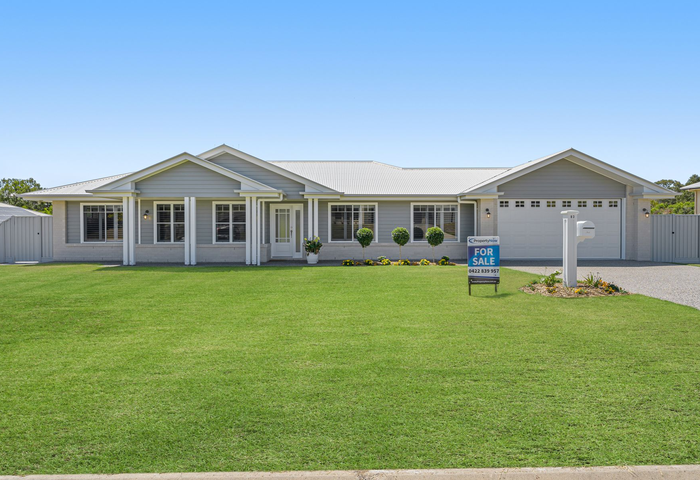 Hampton style home with a charming coastal aura.