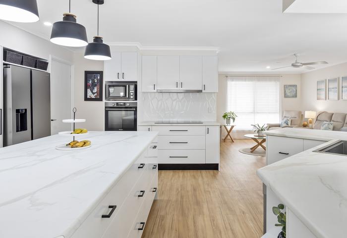 Beautiful renovated 4 bedroom home with a separate 1 bedroom home all on one block