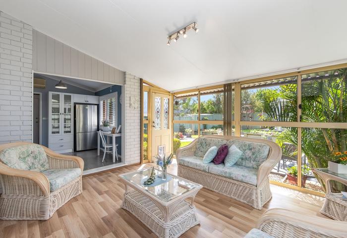 Unique tri-level home with view of  landscaped gardens &amp; gazebo        