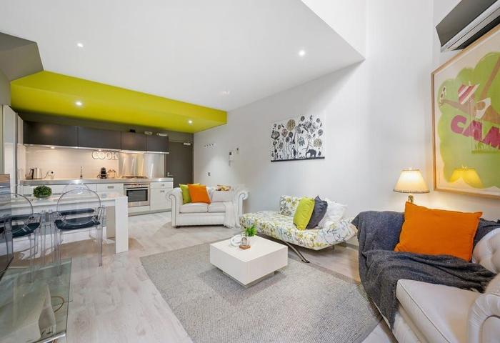 LARGE LOFT LIVING IN A LANDSCAPED OASIS