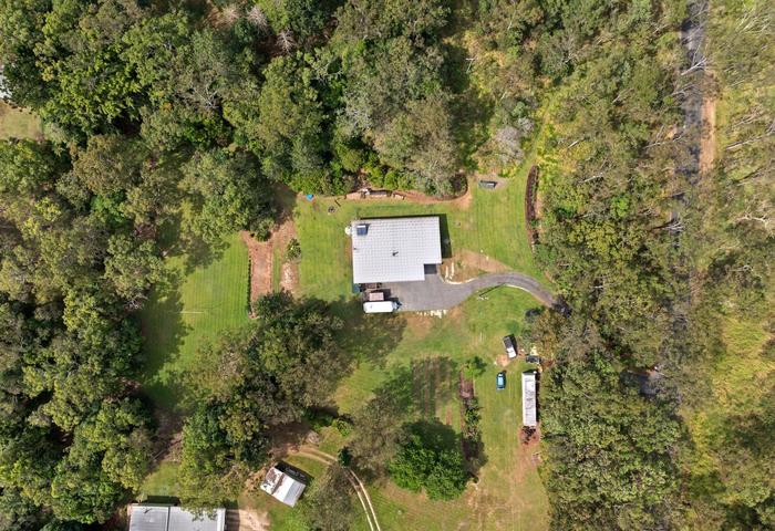 Rare find on 1.25 private acres