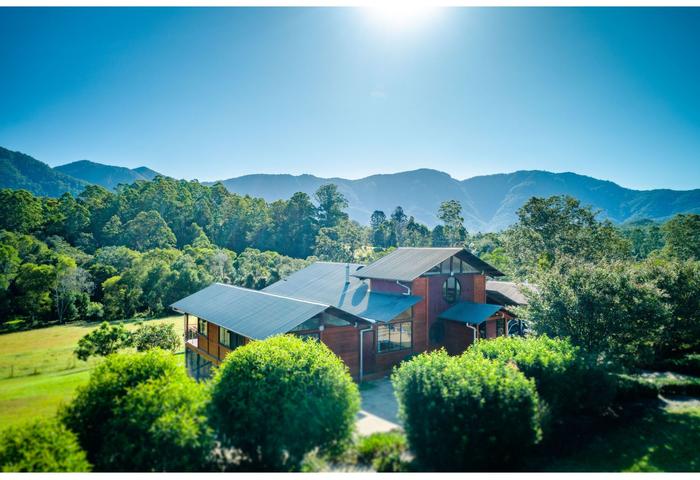 Unique house and 3 luxury holiday chalets + outbuildings on spectacular 100 acre property near Bellingen